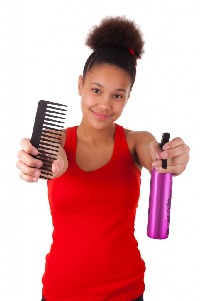 Afro-American young woman with comb